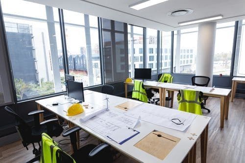 Modern Tampa office with floor-to-ceiling windows used as a location for corporate headshots