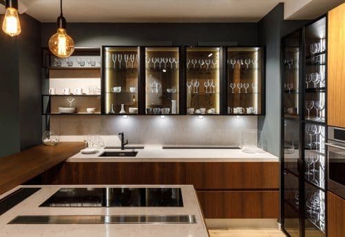 Warmly lit luxury kitchen interior photographed by OC Studios of Tampa Bay for a real estate listing