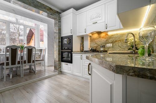 Open-plan kitchen and dining space photographed by OC Studios of Tampa Bay